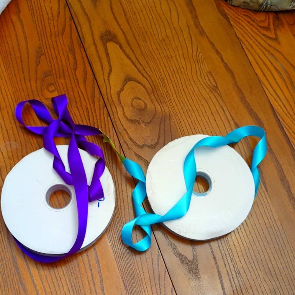 2 Reels of 2 cm ribbon.  Aqua  and purple colours.  7  inch reel. Lots of ribbon